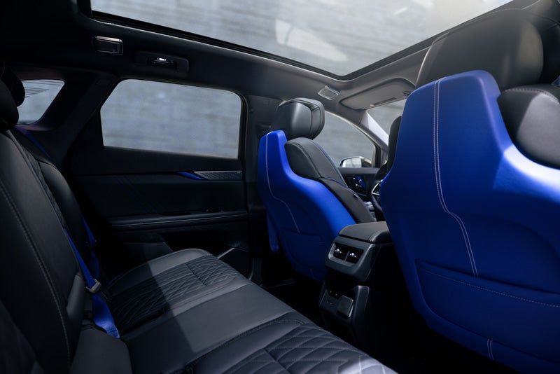 Back Seat View of the 2026 OPTIQ-V Blue Front Seats, Sun Roof, and Interior | Victory Cadillac in Petaluma CA